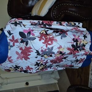 striking floral design. Red flowers,black leaves on a white backdrop.(#1890)